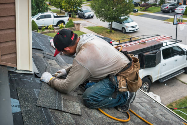 Professional Roof Replacement technician working in Newtonville, MA